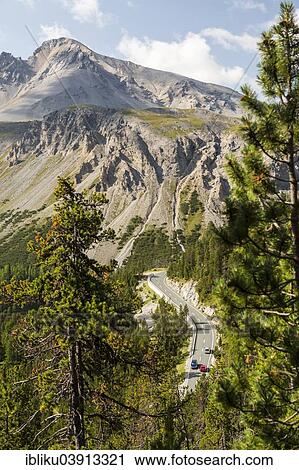 "Fuorn Pass road B 28, behind the mountain Piz Daint, Swiss National Park, Graubunden, Switzerland, Europe" View Large Photo Image Stock Image - "Fuorn Pass road B 28, behind the mountain Piz Daint, Swiss National Park, Graubunden, Switzerland, Europe". Fotosearch