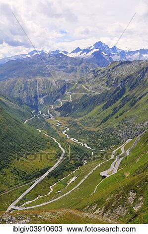 Stock Image - "Furka Pass, the Rhone Valley with the Furka Cogwheel Steam Railway and Grimsel Pass, at Oberwald, Canton of Valais, Switzerland, Europe". Fotosearch