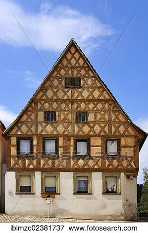 "Gabled house with decorative timber frame from 17-18th Century, market square, Wipfeld, Lower Franconia, Bavaria, Germany, Europe" View Large Photo Image Stock Photo - "Gabled house with decorative timber frame from 17-18th Century, market square, Wipfeld, Lower Franconia, Bavaria, Germany, Europe". Fotosearch