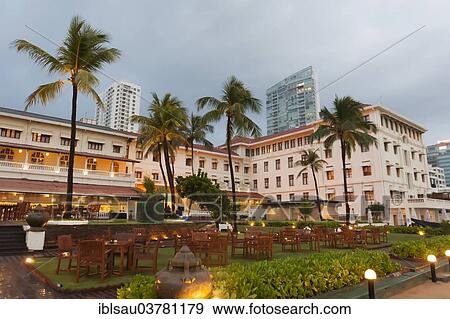 Stock Photo - "Galle Face Hotel, built in 1864, with palm trees in the evening, Colombo, Sri Lanka, Asia". Fotosearch