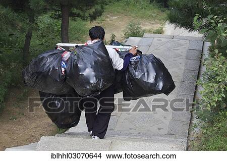 "Garbage collector at the Great Wall of China, Grosse chinesische Mauer, Beijing, China, People's Republic of China, Asia" View Large Photo Image Picture - "Garbage collector at the Great Wall of China, Grosse chinesische Mauer, Beijing, China, People's Republic of China, Asia". Fotosearch
