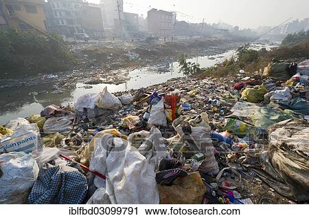 "Garbage dumped at Bhagmati River in the middle of the city, Kathmandu, Kathmandu District, Bagmati Zone, Nepal, Asia" View Large Photo Image Stock Image - "Garbage dumped at Bhagmati River in the middle of the city, Kathmandu, Kathmandu District, Bagmati Zone, Nepal, Asia". Fotosearch