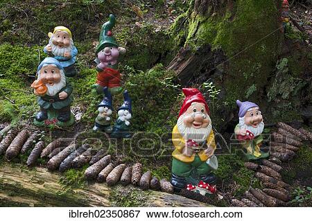 Stock Photo - "Garden gnomes in a forest playground, Hopfgarten, Tyrol, Austria, Europe". Fotosearch