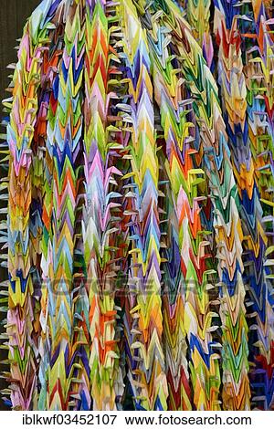 "Garlands of folded objects on sale as good luck charms, origami, Fushimi Inari Taisha Shinto shrine, Fushimi, Kyoto, Kinki region, Japan, Asia" View Large Photo Image Stock Photo - "Garlands of folded objects on sale as good luck charms, origami, Fushimi Inari Taisha Shinto shrine, Fushimi, Kyoto, Kinki region, Japan, Asia". Fotosearch