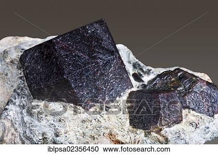 Stock Image - "Garnet, found in the Ziller Valley, North Tyrol, Austria, Europe". Fotosearch