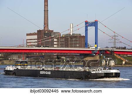 Stock Photography - "Gas tanker on the Rhine River travelling against the current, Homberg, Duisburg, North Rhine-Westphalia, Germany, Europe". Fotosearch
