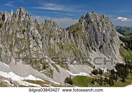 "Gastlosen rocks, limestone cliffs near Ablandschen, Saanen, Canton of Bern, Switzerland, Europe" View Large Photo Image Stock Photo - "Gastlosen rocks, limestone cliffs near Ablandschen, Saanen, Canton of Bern, Switzerland, Europe". Fotosearch