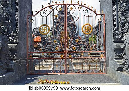 Stock Photo - "Gate with swastika, a symbol of good luck in Hinduism, Pura Segara Temple, Lovina Beach, North Bali, Bali, Indonesia, Asia". Fotosearch