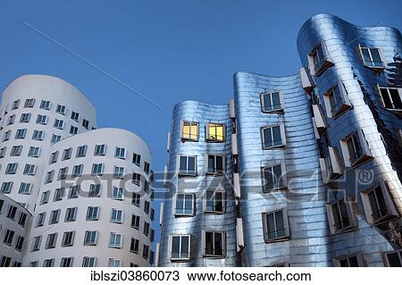 Stock Image - "Gehry Buildings, Neuer Zollhof, Media Harbour, Dusseldorf, North Rhine-Westphalia, Germany, Europe". Fotosearch