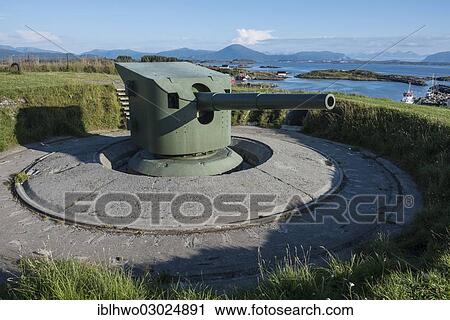 Stock Image - "German cannon with concrete foundations, German military facility during the Second World War, now a station of the war memorials route, Bud, Fraena, Odderoya, Vest-Agder, Southern Norway, Norway, Europe". Fotosearch