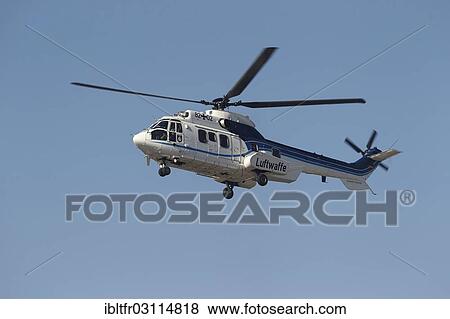 Stock Photo - "German Chancellor Angela Merkel leaving the CEBIT trade fair in a Cougar AS 532 helicopter from the Flugbereitschaft, the Special Air Mission Wing of the Federal Ministry of Defence, Hannover, Lower Saxony, Germany, Europe". Fotosearch