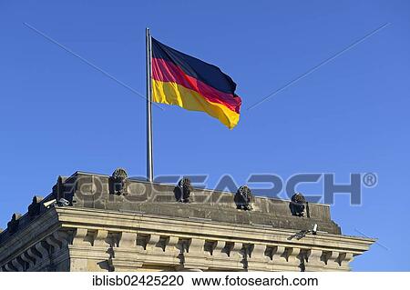 "German flag on one of the towers of the Reichstag building, Berlin, Germany, Europe" View Large Photo Image Stock Image - "German flag on one of the towers of the Reichstag building, Berlin, Germany, Europe". Fotosearch