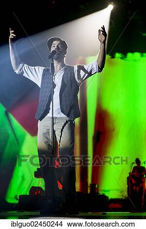"German soul singer and songwriter Michael Schuppach, alias MC Donet, performing live at Energy Stars For Free in Hallenstadion, Zurich, Switzerland, Europe" View Large Photo Image Picture - "German soul singer and songwriter Michael Schuppach, alias MC Donet, performing live at Energy Stars For Free in Hallenstadion, Zurich, Switzerland, Europe". Fotosearch