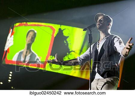 Stock Image - "German soul singer and songwriter Michael Schuppach, alias MC Donet, performing live at Energy Stars For Free in Hallenstadion, Zurich, Switzerland, Europe". Fotosearch