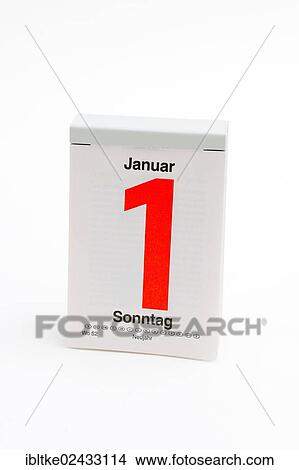 Picture - "German tear-off calendar, Sunday, 1st January, New Year's Day". Fotosearch