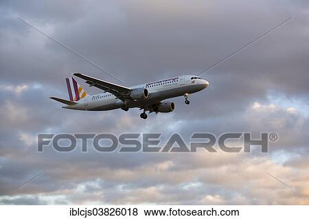 "Germanwings airplane during the landing approach at Cologne-Bonn Airport at dusk, Cologne, North Rhine-Westphalia, Germany, Europe" View Large Photo Image Stock Photo - "Germanwings airplane during the landing approach at Cologne-Bonn Airport at dusk, Cologne, North Rhine-Westphalia, Germany, Europe". Fotosearch