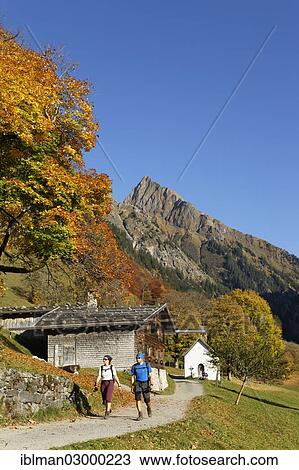 Stock Image - "Gerstruben with Hoefats mountain in autumn, Allgaeu Alps, Oberstdorf, Oberallgau, Allgau, Swabia, Bavaria, Germany, Europe". Fotosearch