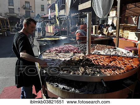 "Giant barbecue at the annual All Saints Market in Cocentaina, Alicante province, Spain, Europe" View Large Photo Image Stock Image - "Giant barbecue at the annual All Saints Market in Cocentaina, Alicante province, Spain, Europe". Fotosearch