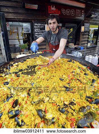 "Giant Paella dish, food sellers, Camden Market, Camden Town, London, England, United Kingdom, Europe" View Large Photo Image Stock Image - "Giant Paella dish, food sellers, Camden Market, Camden Town, London, England, United Kingdom, Europe". Fotosearch