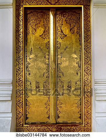 "Gilded entrance door to a temple, detailed ornamentation, guards with swords, Chiang Mai, Northern Thailand, Thailand, Asia" View Large Photo Image Picture - "Gilded entrance door to a temple, detailed ornamentation, guards with swords, Chiang Mai, Northern Thailand, Thailand, Asia". Fotosearch