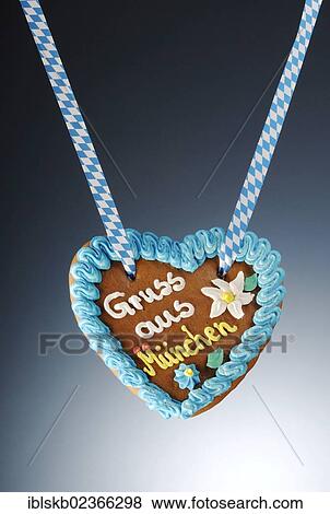 "Gingerbread heart with the message """"Gruss aus Muenchen"""", German for """"Greetings from Munich""""" View Large Photo Image Stock Photo - "Gingerbread heart with the message """"Gruss aus Muenchen"""", German for """"Greetings from Munich""""". Fotosearch