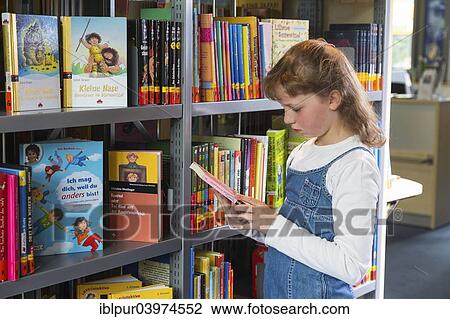 "Girl, 10 years, in a children's library, public library, Coswig, Saxony, Germany, Europe" View Large Photo Image Stock Image - "Girl, 10 years, in a children's library, public library, Coswig, Saxony, Germany, Europe". Fotosearch