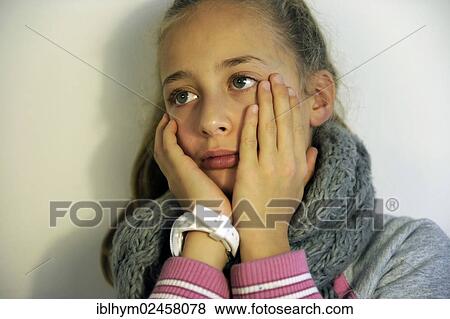 "Girl, 10 years old, pensive" View Large Photo Image Stock Photo - "Girl, 10 years old, pensive". Fotosearch