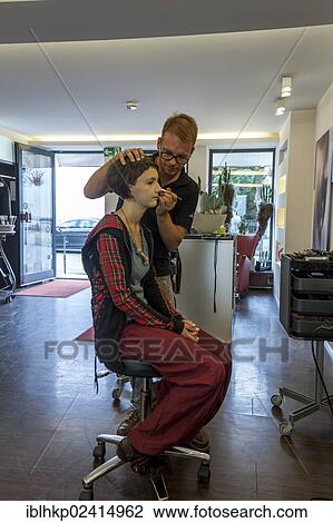 Girl, 14, at the hairdresser, having make-up applied View Large Photo Image Stock Image - Girl, 14, at the hairdresser, having make-up applied. Fotosearch