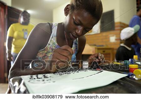 "Girl, 15, during a craft and painting course for street children as part of the Sao Martinho social project, Lapa district, Rio de Janeiro, Rio de Janeiro State, Brazil, South America" View Large Photo Image Stock Photo - "Girl, 15, during a craft and painting course for street children as part of the Sao Martinho social project, Lapa district, Rio de Janeiro, Rio de Janeiro State, Brazil, South America". Fotosearch