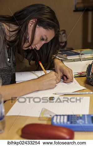 "Girl, 16 years, doing math homework, Germany, Europe" View Large Photo Image Picture - "Girl, 16 years, doing math homework, Germany, Europe". Fotosearch