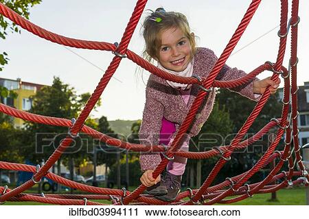 "Girl, 3 years, climbing a rope climbing scaffold, Wurzburg, Bavaria, Germany, Europe" View Large Photo Image Stock Image - "Girl, 3 years, climbing a rope climbing scaffold, Wurzburg, Bavaria, Germany, Europe". Fotosearch