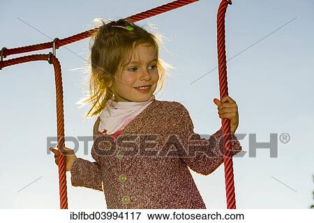 "Girl, 3 years, climbing a rope climbing scaffold, Wurzburg, Bavaria, Germany, Europe" View Large Photo Image Stock Photo - "Girl, 3 years, climbing a rope climbing scaffold, Wurzburg, Bavaria, Germany, Europe". Fotosearch