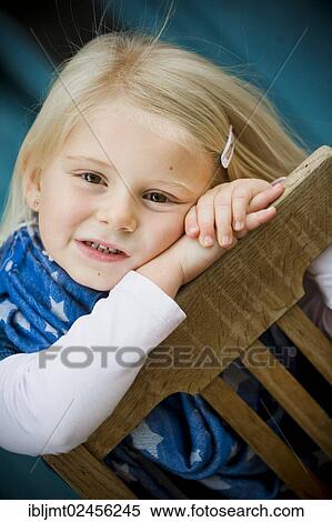 "Girl, 4 years old with her head leaning on a chair" View Large Photo Image Stock Photography - "Girl, 4 years old with her head leaning on a chair". Fotosearch