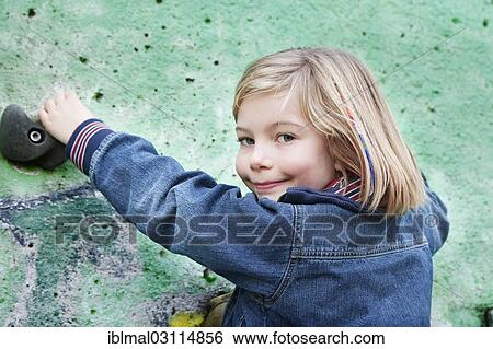 "Girl, 7 years, climbing on a climbing wall, Esslingen, Baden-Wurttemberg, Germany, Europe" View Large Photo Image Stock Photograph - "Girl, 7 years, climbing on a climbing wall, Esslingen, Baden-Wurttemberg, Germany, Europe". Fotosearch