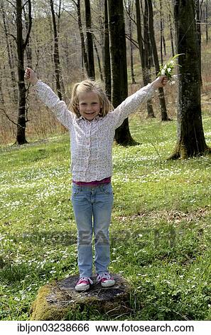 "Girl, 7 years, picking Wood Anemones (Anemone nemorosa), Krageholm, Scania, Sweden, Europe" View Large Photo Image Stock Photograph - "Girl, 7 years, picking Wood Anemones (Anemone nemorosa), Krageholm, Scania, Sweden, Europe". Fotosearch