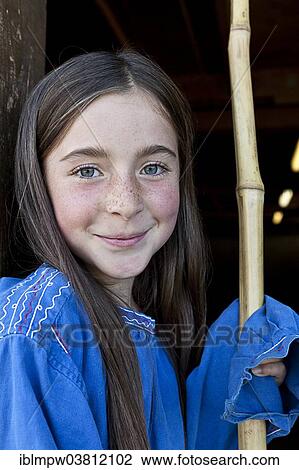 "Girl, 8 years, portrait, holding a shepherd's crook, Alp Gun, Graubunden, Switzerland, Europe" View Large Photo Image Stock Image - "Girl, 8 years, portrait, holding a shepherd's crook, Alp Gun, Graubunden, Switzerland, Europe". Fotosearch