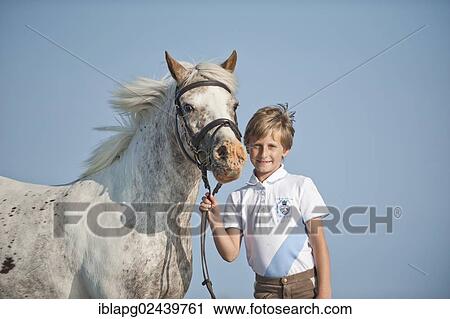 Girl and a pony View Large Photo Image Stock Image - Girl and a pony. Fotosearch