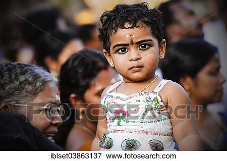 "Girl at Hindu temple festival, Thrissur, Kerala, South India, India, Asia" View Large Photo Image Stock Photo - "Girl at Hindu temple festival, Thrissur, Kerala, South India, India, Asia". Fotosearch