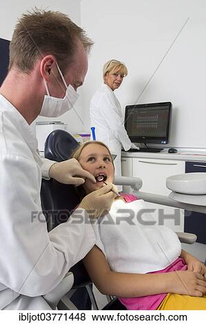 "Girl at the dentist, Germany, Europe" View Large Photo Image Stock Photo - "Girl at the dentist, Germany, Europe". Fotosearch