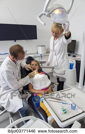 "Girl at the dentist, Germany, Europe" View Large Photo Image Stock Photograph - "Girl at the dentist, Germany, Europe". Fotosearch