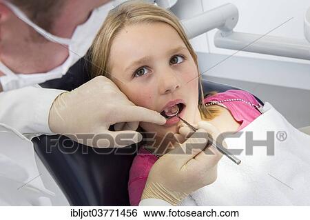Stock Photograph - "Girl at the dentist, Germany, Europe". Fotosearch