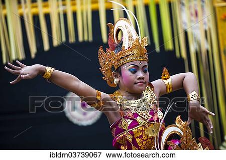 Stock Photo - "Girl during a Barong dance, Ubud, Bali, Indonesia, Asia". Fotosearch