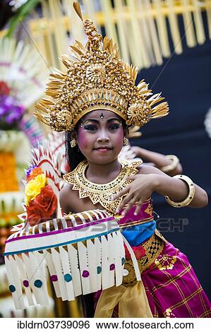 Stock Photograph - "Girl during a Barong dance, Ubud, Bali, Indonesia, Asia". Fotosearch