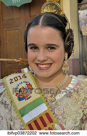 Stock Image - "Girl from the Falla group """"La Font"""" wearing traditional dress at the Las Fallas Spring Festival, Pego, Province of Alicante, Spain, Europe". Fotosearch
