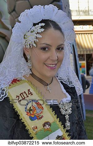 "Girl from the Falla group """"La Font"""" wearing traditional dress at the Las Fallas Spring Festival, Pego, Province of Alicante, Spain, Europe" View Large Photo Image Stock Photography - "Girl from the Falla group """"La Font"""" wearing traditional dress at the Las Fallas Spring Festival, Pego, Province of Alicante, Spain, Europe". Fotosearch