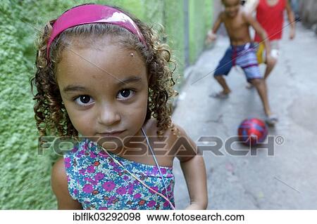 "Girl in a slum or favela, Jacarezinho favela, Rio de Janeiro, Rio de Janeiro State, Brazil, South America" View Large Photo Image Stock Photo - "Girl in a slum or favela, Jacarezinho favela, Rio de Janeiro, Rio de Janeiro State, Brazil, South America". Fotosearch