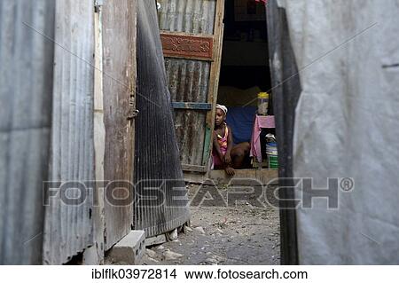 "Girl in the entrance of a shack, Camp Icare for earthquake refugees, Fort National, Port-au-Prince, Haiti, North America" View Large Photo Image Picture - "Girl in the entrance of a shack, Camp Icare for earthquake refugees, Fort National, Port-au-Prince, Haiti, North America". Fotosearch