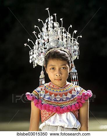 "Girl of the ethnic group of the Iban people wearing traditional dress with a headdress, Skrang River, Rajang, Sarawak, Borneo, Malaysia, Asia" View Large Photo Image Stock Image - "Girl of the ethnic group of the Iban people wearing traditional dress with a headdress, Skrang River, Rajang, Sarawak, Borneo, Malaysia, Asia". Fotosearch
