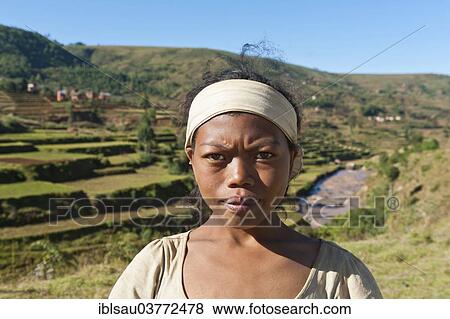"Girl of the Merina people, portrait, at a rice paddy near Antsirabe, Madagascar, Africa" View Large Photo Image Stock Photo - "Girl of the Merina people, portrait, at a rice paddy near Antsirabe, Madagascar, Africa". Fotosearch