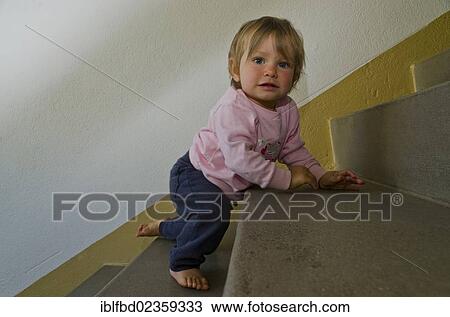 "Girl, one year, crawling up a stairway, Dresden, Saxony, Germany, Europe" View Large Photo Image Stock Image - "Girl, one year, crawling up a stairway, Dresden, Saxony, Germany, Europe". Fotosearch
